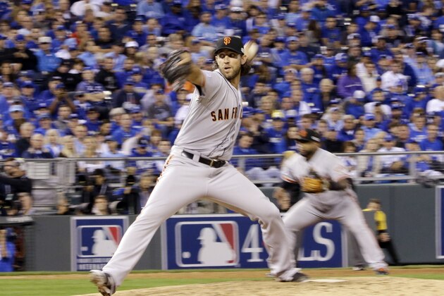 San Francisco Giants pitcher Madison Bumgarner throws during the fifth inning of Game 1 of baseball's World Series against the Kansas City Royals Tuesday, Oct. 21, 2014, in Kansas City, Mo. (AP Photo/David J. Phillip)