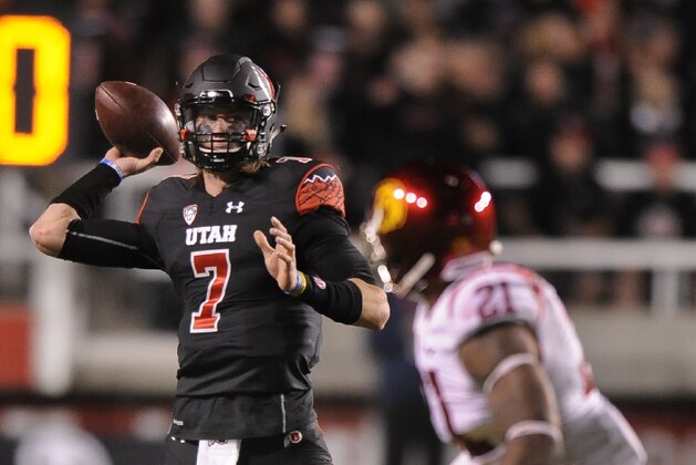 SALT LAKE CITY, UT - OCTOBER 25: Quarterback Travis Wilson #7 of the Utah Utes passes in the 2nd quarter against the USC Trojans at Rice-Eccles Stadium on October 25, 2014 in Salt Lake City, Utah. (Photo by Gene Sweeney Jr/Getty Images )