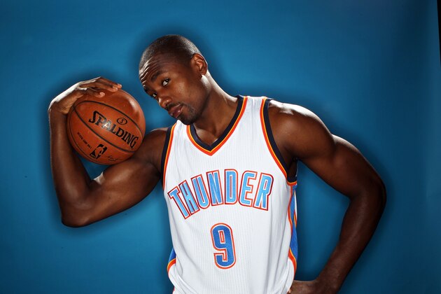 OKLAHOMA CITY, OK - SEPTEMBER 29: Serge Ibaka #9 of the Oklahoma City Thunder poses for a portrait during 2014 NBA Media Day on September 29, 2014 at the Thunder Events Center in Edmond, Oklahoma. NOTE TO USER: User expressly acknowledges and agrees that, by downloading and or using this Photograph, user is consenting to the terms and conditions of the Getty Images License Agreement. Mandatory Copyright Notice: Copyright 2014 NBAE (Photo by Layne Murdoch/NBAE via Getty Images)