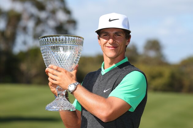 PERTH, AUSTRALIA - OCTOBER 26:  Thorbjorn Olesen of Denmark poses with the trophy after winning the 2014 Perth International at Lake Karrinyup Country Club on October 26, 2014 in Perth, Australia.  (Photo by Paul Kane/Getty Images)