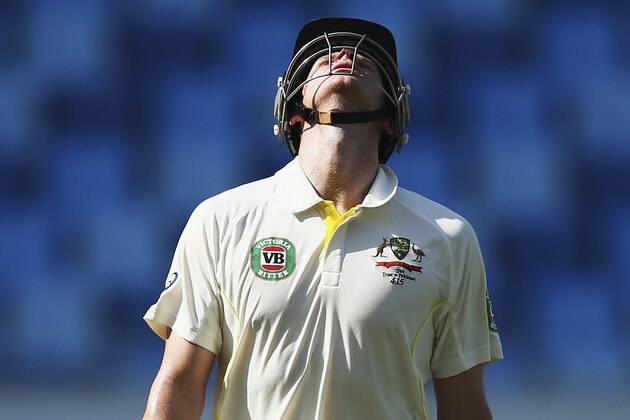 DUBAI, UNITED ARAB EMIRATES - OCTOBER 26:  Steve Smith of Australia looks dejected after being dismissed by Yasir Shah of Pakistan during Day Five of the First Test between Pakistan and Australia at Dubai International Stadium on October 26, 2014 in Dubai, United Arab Emirates.  (Photo by Ryan Pierse/Getty Images)