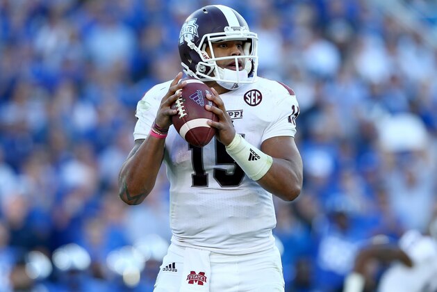 LEXINGTON, KY - OCTOBER 25:  Dak Prescott #15 of the Mississippi State Bulldogs looks to pass the ball during the game against the Kentucky Wildcats at Commonwealth Stadium on October 25, 2014 in Lexington, Kentucky.  (Photo by Andy Lyons/Getty Images)