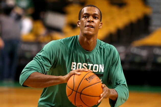 BOSTON, MA - OCTOBER 22:  Rajon Rondo #9 of the Boston Celtics warms up prior to a preseason game against the Brooklyn Nets at TD Garden on October 22, 2014 in Boston, Massachusetts. NOTE TO USER: User expressly acknowledges and agrees that, by downloading and or using this photograph, User is consenting to the terms and conditions of the Getty Images License Agreement.  (Photo by Mike Lawrie/Getty Images)