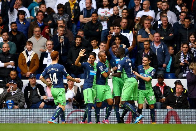 LONDON, ENGLAND - OCTOBER 26:  Sammy Ameobi of Newcastle United celebrates with team-mates after scoring his team's first goal during the Barclays Premier League match between Tottenham Hotspur and Newcastle United at White Hart Lane on October 26, 2014 in London, England.  (Photo by Richard Heathcote/Getty Images)