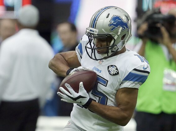 Detroit Lions wide receiver Golden Tate (15) warms up before the NFL football game against the Atlanta Falcons at Wembley Stadium, London, Sunday, Oct. 26, 2014.  (AP Photo/Matt Dunham)