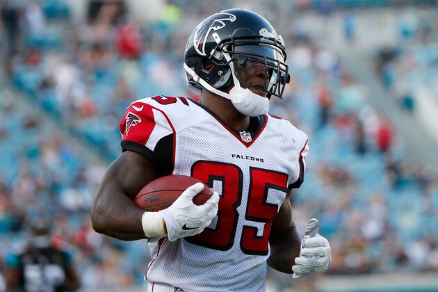 JACKSONVILLE, FL - AUGUST 28:  Antone Smith #35 of the Atlanta Falcons runs for a touchdown during the preseason NFL game against the Jacksonville Jaguars at EverBank Field on August 28, 2014 in Jacksonville, Florida.  (Photo by Sam Greenwood/Getty Images)
