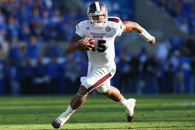 LEXINGTON, KY - OCTOBER 25:  Dak Prescott #15 of the Mississippi State Bulldogs runs with the ball during the game against the Kentucky Wildcats at Commonwealth Stadium on October 25, 2014 in Lexington, Kentucky.  (Photo by Andy Lyons/Getty Images)