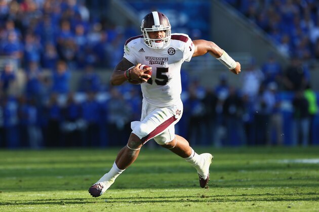LEXINGTON, KY - OCTOBER 25:  Dak Prescott #15 of the Mississippi State Bulldogs runs with the ball during the game against the Kentucky Wildcats at Commonwealth Stadium on October 25, 2014 in Lexington, Kentucky.  (Photo by Andy Lyons/Getty Images)