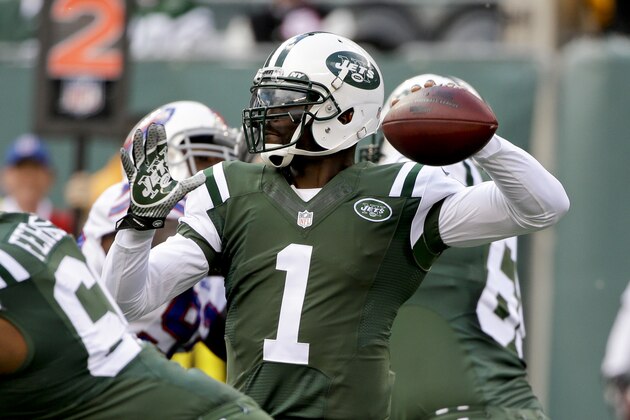New York Jets quarterback Michael Vick (1) throws a pass during the first half of an NFL football game against the Buffalo Bills, Sunday, Oct. 26, 2014, in East Rutherford. (AP Photo/Seth Wenig)