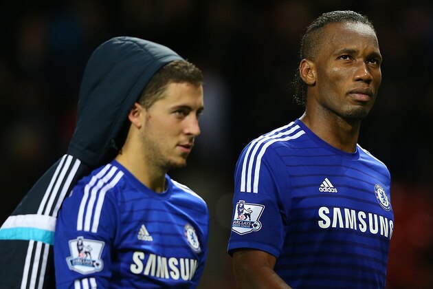 MANCHESTER, ENGLAND - OCTOBER 26:  Eden Hazard and Didier Drogba of Chelsea (R) walk off at the end of the Barclays Premier League match between Manchester United and Chelsea at Old Trafford on October 26, 2014 in Manchester, England.  (Photo by Alex Livesey/Getty Images)