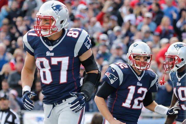 FOXBORO, MA - OCTOBER 26:  Rob Gronkowski #87, Tom Brady #12, and Brandon LaFell#19 of the New England Patriots react after LaFell caught a touchdown pass during the second quarter against the Chicago Bears at Gillette Stadium on October 26, 2014 in Foxboro, Massachusetts.  (Photo by Jim Rogash/Getty Images)