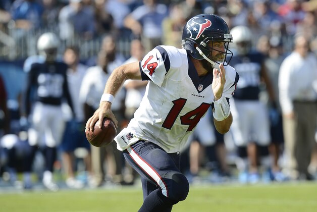 Houston Texans quarterback Ryan Fitzpatrick scrambles against the Tennessee Titans in the second quarter of an NFL football game Sunday, Oct. 26, 2014, in Nashville, Tenn. (AP Photo/Mark Zaleski)