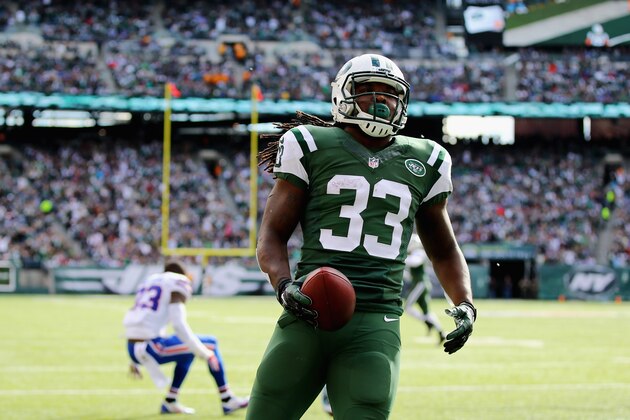 EAST RUTHERFORD, NJ - OCTOBER 26:  Chris Ivory #33 of the New York Jets scores a touchdown against the Buffalo Bills and  Nigel Bradham #53 in the second quarter at MetLife Stadium on October 26, 2014 in East Rutherford, New Jersey.  (Photo by Al Bello/Getty Images)
