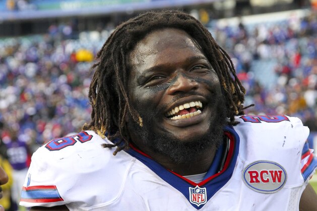 Buffalo Bills running back Anthony Dixon (26) smiles after an NFL football game against the Minnesota Vikings Sunday, Oct. 19, 2014, in Orchard Park, N.Y. The Bills won the game 17-16. (AP Photo/Bill Wippert)