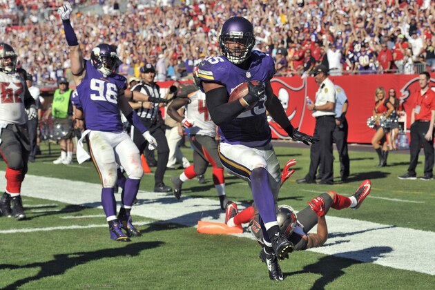 Minnesota Vikings outside linebacker Anthony Barr (55) scores after recovering a fumble by Tampa Bay Buccaneers tight end Austin Seferian-Jenkins in overtime during an NFL football game, Sunday, Oct. 26, 2014, in Tampa, Fla. (AP Photo/Steve Nesius)