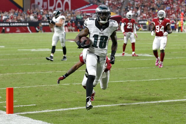 Philadelphia Eagles wide receiver Jeremy Maclin (18) scores a touchdown against the Arizona Cardinals during the first half of an NFL football game, Sunday, Oct. 26, 2014, in Glendale, Ariz. (AP Photo/Ross D. Franklin)