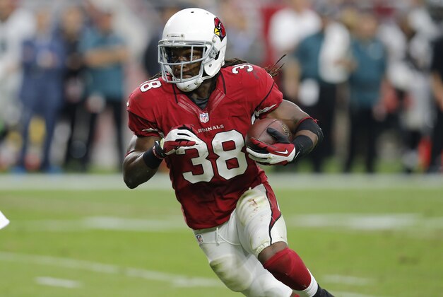 Arizona Cardinals running back Andre Ellington (38) scores a touchdown against the Philadelphia Eagles during the first half of an NFL football game, Sunday, Oct. 26, 2014, in Glendale, Ariz. (AP Photo/Rick Scuteri)
