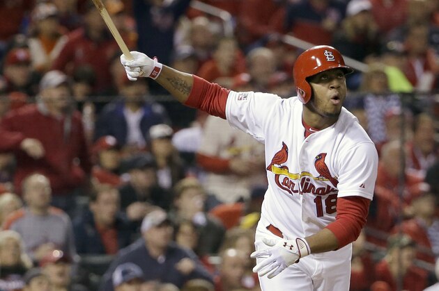 St. Louis Cardinals' Oscar Taveras hits a home run during the seventh inning in Game 2 of the National League baseball championship series against the San Francisco Giants Sunday, Oct. 12, 2014, in St. Louis. (AP Photo/David J. Phillip)