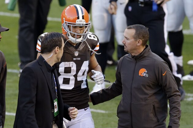 Cleveland Browns tight end Jordan Cameron (84) is helped off the field after an injury in the second quarter of an NFL football game against the Oakland Raiders, Sunday, Oct. 26, 2014, in Cleveland. Cameron left the game, won by the Browns 23-13, with concussion symptoms. (AP Photo/Tony Dejak)
