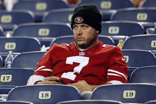 A San Francisco 49ers fans watches the second half of an NFL football game against the Denver Broncos, Sunday, Oct. 19, 2014, in Denver.  The Broncos won 42-17. (AP Photo/Joe Mahoney)