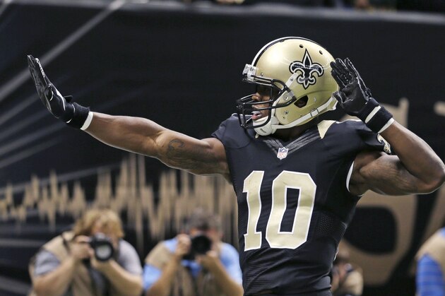 New Orleans Saints wide receiver Brandin Cooks (10) celebrates his touchdown in the first half of an NFL football game against the Green Bay Packers in New Orleans, Sunday, Oct. 26, 2014. (AP Photo/Bill Haber)