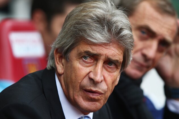 LONDON, ENGLAND - OCTOBER 25: Manuel Pellegrini, manager of Manchester City looks on during the Barclays Premier League match between West Ham United and Manchester City at Boleyn Ground on October 25, 2014 in London, England.  (Photo by Ian Walton/Getty Images)