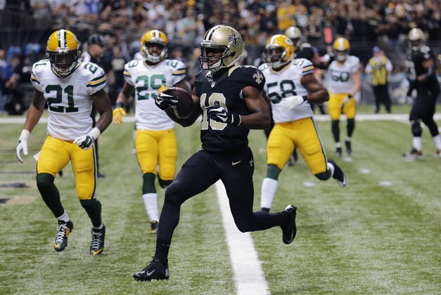 New Orleans Saints wide receiver Brandin Cooks (10) scores a touchdown in the first half of an  NFL football game against the Green Bay Packers in New Orleans, Sunday, Oct. 26, 2014. (AP Photo/Bill Haber)