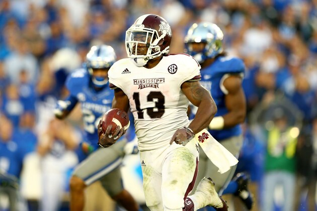 LEXINGTON, KY - OCTOBER 25:  Josh Robinson #13 of the Mississippi State Bulldogs runs for a touchdown during the game against the Kentucky Wildcats at Commonwealth Stadium on October 25, 2014 in Lexington, Kentucky.  (Photo by Andy Lyons/Getty Images)
