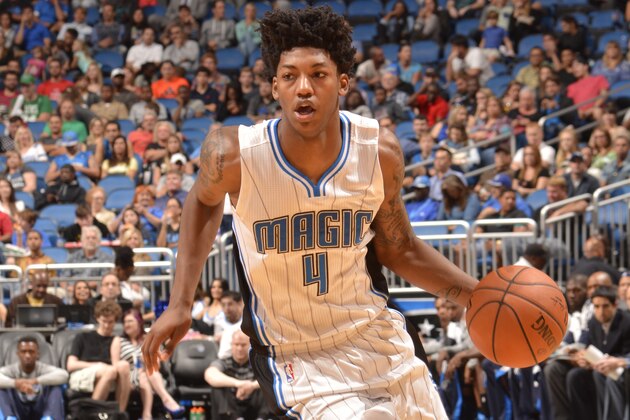 ORLANDO, FL - OCTOBER 24: Elfrid Payton #4 of the Orlando Magic handles the ball against the Dallas Mavericks on October 24, 2014 at Amway Center in Orlando, Florida. NOTE TO USER: User expressly acknowledges and agrees that, by downloading and or using this photograph, User is consenting to the terms and conditions of the Getty Images License Agreement. Mandatory Copyright Notice: Copyright 2014 NBAE (Photo by Fernando Medina/NBAE via Getty Images)
