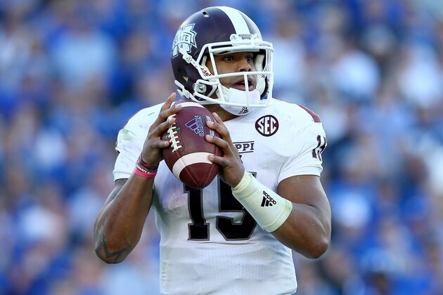 LEXINGTON, KY - OCTOBER 25:  Dak Prescott #15 of the Mississippi State Bulldogs looks to pass the ball during the game against the Kentucky Wildcats at Commonwealth Stadium on October 25, 2014 in Lexington, Kentucky.  (Photo by Andy Lyons/Getty Images)