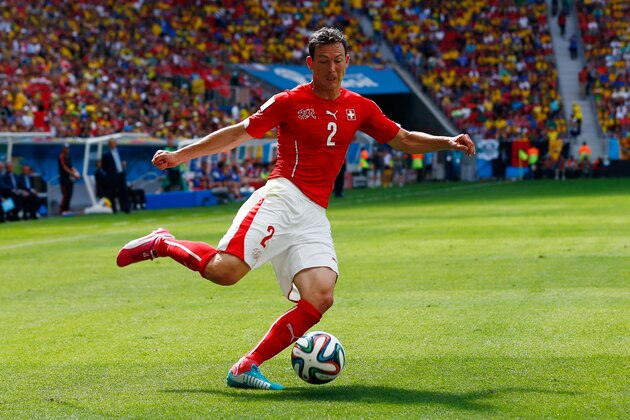 BRASILIA, BRAZIL - JUNE 15:  Stephan Lichtsteiner of Switzerland controls the ball during the 2014 FIFA World Cup Brazil Group E match between Switzerland and Ecuador at Estadio Nacional on June 15, 2014 in Brasilia, Brazil.  (Photo by Matthew Lewis/Getty Images)