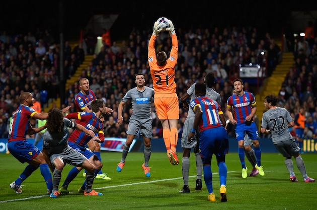 LONDON, ENGLAND - SEPTEMBER 24:  Rob Elliot of Newcastle catches the ball in a circle of players during the Capital One Cup Third Round match between Crystal Palace and Newcastle United at Selhurst Park on September 24, 2014 in London, England.  (Photo by Mike Hewitt/Getty Images)