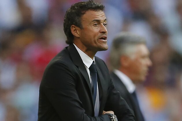 Barcelona’s head coach Luis Enrique, gestures during a Spanish La Liga soccer match between Real Madrid and FC Barcelona at the Santiago Bernabeu stadium in Madrid, Spain, Saturday, Oct. 25, 2014. (AP Photo/Andres Kudacki)