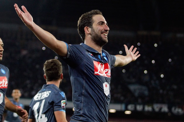 NAPLES, ITALY - OCTOBER 26:  Gonzalo Higuain of Napoli celebrates after scoring his third goal during the Serie A match between SSC Napoli and Hellas Verona FC at Stadio San Paolo on October 26, 2014 in Naples, Italy.  (Photo by Maurizio Lagana/Getty Images)