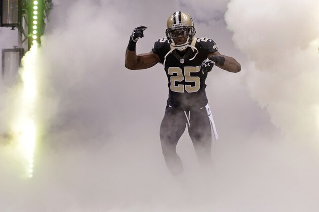 New Orleans Saints free safety Rafael Bush (25) enters the field during pre-game introductions before an NFL football game against the Green Bay Packers in New Orleans, Sunday, Oct. 26, 2014. (AP Photo/Gerald Herbert)