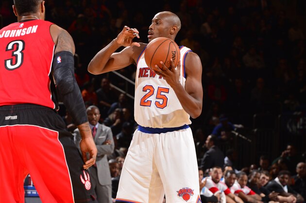 NEW YORK, NY - OCTOBER 13:  Travis Outlaw #25 of the New York Knicks handles the ball against the Toronto Raptors during a game at Madison Square Garden on October 13, 2014 in New York City, New York. NOTE TO USER: User expressly acknowledges and agrees that, by downloading and or using this photograph, User is consenting to the terms and conditions of the Getty Images License Agreement. Mandatory Copyright Notice: Copyright 2014 NBAE  (Photo by David Dow/NBAE via Getty Images)