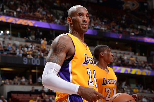 ANAHEIM, CA - OCTOBER 21: Kobe Bryant #24 of the Los Angeles Lakers looks on during a game against the Phoenix Suns on October 21, 2014 at the Honda Center in Anaheim, California. NOTE TO USER:  User expressly acknowledges and agrees that, by downloading and or using this Photograph, user is consenting to the terms and conditions of the Getty Images License Agreement.  Mandatory Copyright Notice:  Copyright 2014 NBAE (Photo by Andrew D. Bernstein/NBAE via Getty Images)