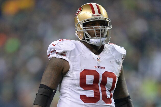 Jan 19, 2014; Seattle, WA, USA; San Francisco 49ers defensive lineman Glenn Dorsey (90) during the second half of the 2013 NFC Championship football game against the Seattle Seahawks at CenturyLink Field. The Seahawks defeated the 49ers 23-17 to advance to Super Bowl XLVIII. Mandatory Credit: Kirby Lee-USA TODAY Sports