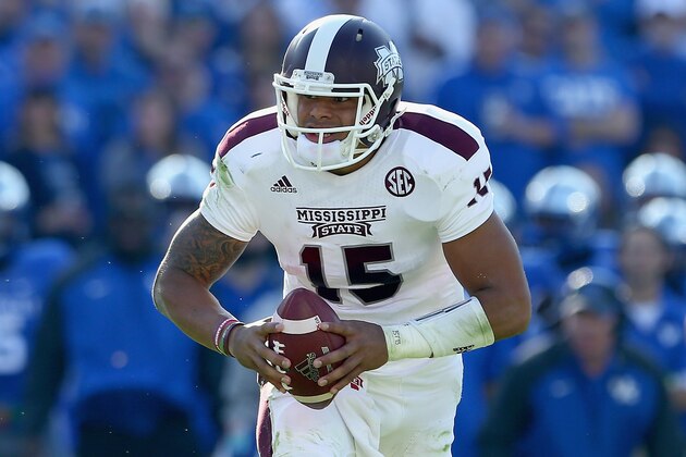 LEXINGTON, KY - OCTOBER 25:  Dak Prescott #15 of the Mississippi State Bulldogs runs with the ball during the game against the Kentucky Wildcats at Commonwealth Stadium on October 25, 2014 in Lexington, Kentucky.  (Photo by Andy Lyons/Getty Images)