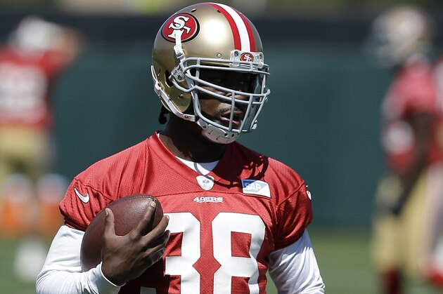 San Francisco 49ers running back Marcus Lattimore (38) carries a ball during NFL football mini-camp in Santa Clara, Calif., Tuesday, June 17, 2014. (AP Photo/Jeff Chiu)