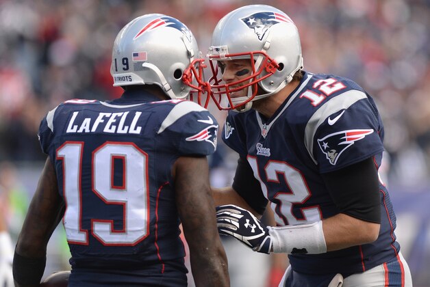 FOXBORO, MA - OCTOBER 26:  Brandon LaFell #19 reacts alongside Tom Brady #12 of the New England Patriots after catching a touchdown pass during the second quarter against the Chicago Bears at Gillette Stadium on October 26, 2014 in Foxboro, Massachusetts.  (Photo by Darren McCollester/Getty Images)