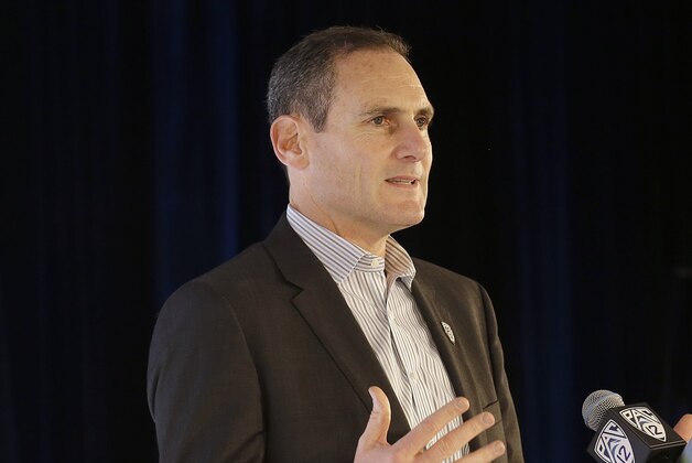 Pac-12 Commissioner Larry Scott speaks during NCAA college basketball Pac-12 media day in San Francisco, Thursday, Oct. 23, 2014. (AP Photo/Jeff Chiu)