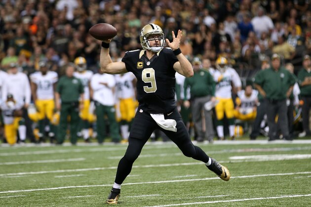 NEW ORLEANS, LA - OCTOBER 26:  Drew Brees #9 of the New Orleans Saints agains the Green Bay Packers at Mercedes-Benz Superdome on October 26, 2014 in New Orleans, Louisiana.  (Photo by Chris Graythen/Getty Images)
