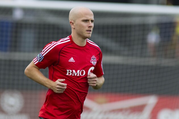 Aug 9, 2014; Columbus, OH, USA; Toronto FC midfielder Michael Bradley (4) runs onto the field before the game against the Columbus Crew at Crew Stadium. Mandatory Credit: Trevor Ruszkowski-USA TODAY Sports