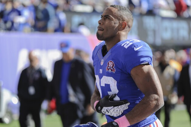 New York Giants running back Rashad Jennings runs off the field at the end of the first half of an NFL football game against the Atlanta Falcons, Sunday, Oct. 5, 2014, in East Rutherford, N.J. (AP Photo/Bill Kostroun)
