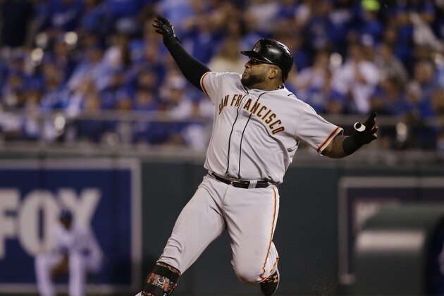 San Francisco Giants Pablo Sandoval tags up at second base after hitting a double during the fourth inning of Game 2 of baseball's World Series against the Kansas City Royals Wednesday, Oct. 22, 2014, in Kansas City, Mo. (AP Photo/Charlie Neibergall)