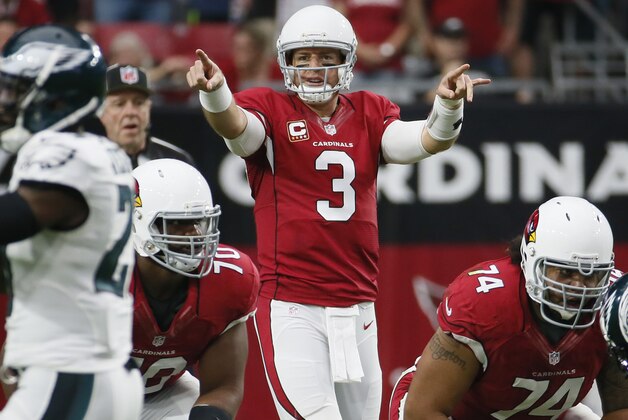 Arizona Cardinals quarterback Carson Palmer (3) calls a play against the Philadelphia Eagles during the first half of an NFL football game, Sunday, Oct. 26, 2014, in Glendale, Ariz. (AP Photo/Matt York)