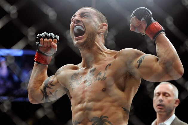 Cub Swanson reacts after defeating Dennis Siver during the third round of their UFC 162 mixed martial arts featherweight bout at the MGM Grand Garden Arena on Saturday, July 6, 2013, in Las Vegas. (AP Photo/David Becker)