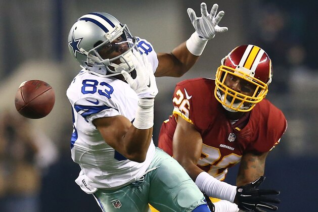 ARLINGTON, TX - OCTOBER 27:  Terrance Williams #83 of the Dallas Cowboys is unable to make the catch as Bashaud Breeland #26 of the Washington Redskins defends during the first half at AT&T Stadium on October 27, 2014 in Arlington, Texas.  (Photo by Ronald Martinez/Getty Images)