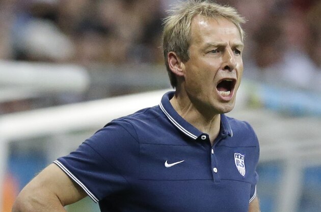 United States' head coach Juergen Klinsmann shouts out during the World Cup round of 16 soccer match between Belgium and the USA at the Arena Fonte Nova in Salvador, Brazil, Tuesday, July 1, 2014. (AP Photo/Matt Dunham)